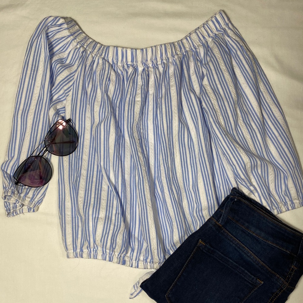 Off the shoulders stripped blue and white blouse.